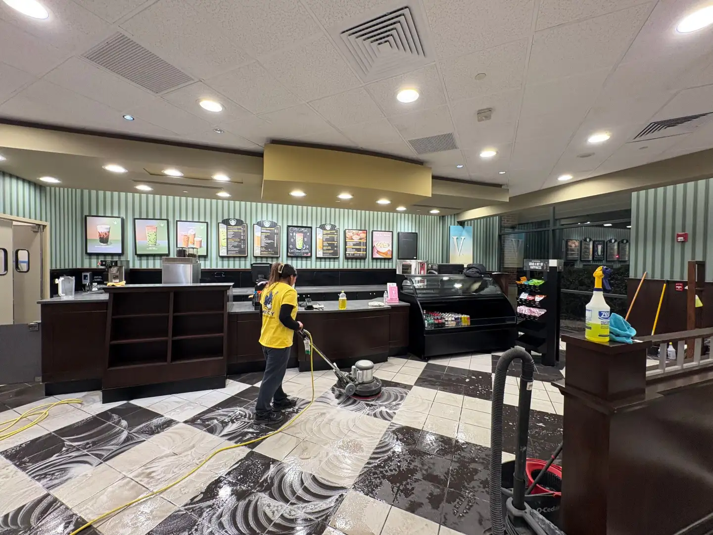 Commercial floor scrubber deep cleaning a restaurant floor in Huntsville, AL