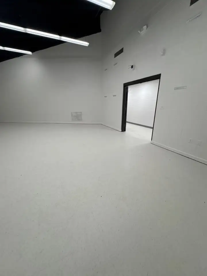 Freshly cleaned and polished commercial hall floor in Huntsville, AL