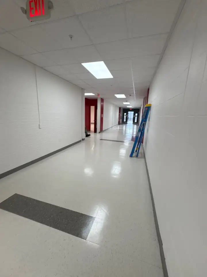 Spotless commercial hallway floor cleaned by our Huntsville team