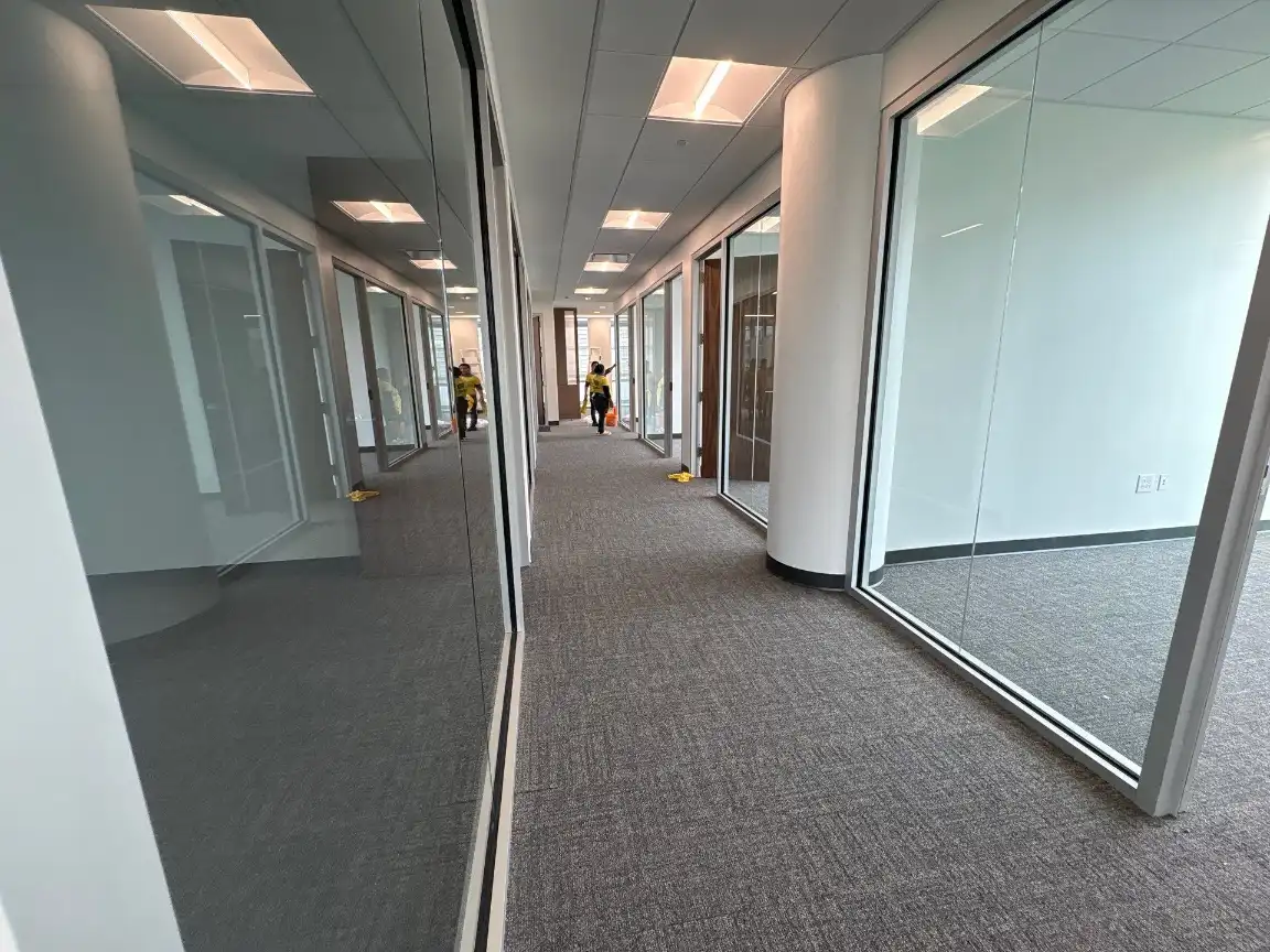 Freshly cleaned carpeted office hallway in a Huntsville, AL commercial building