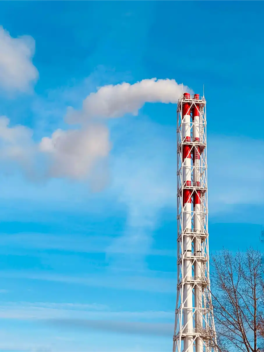 Industrial smokestack and plant exterior in North Alabama