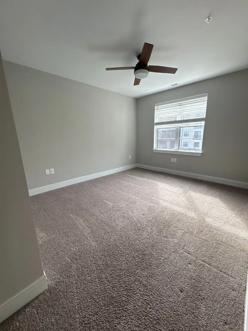 Spotless carpeted room after professional carpet cleaning in Huntsville, AL