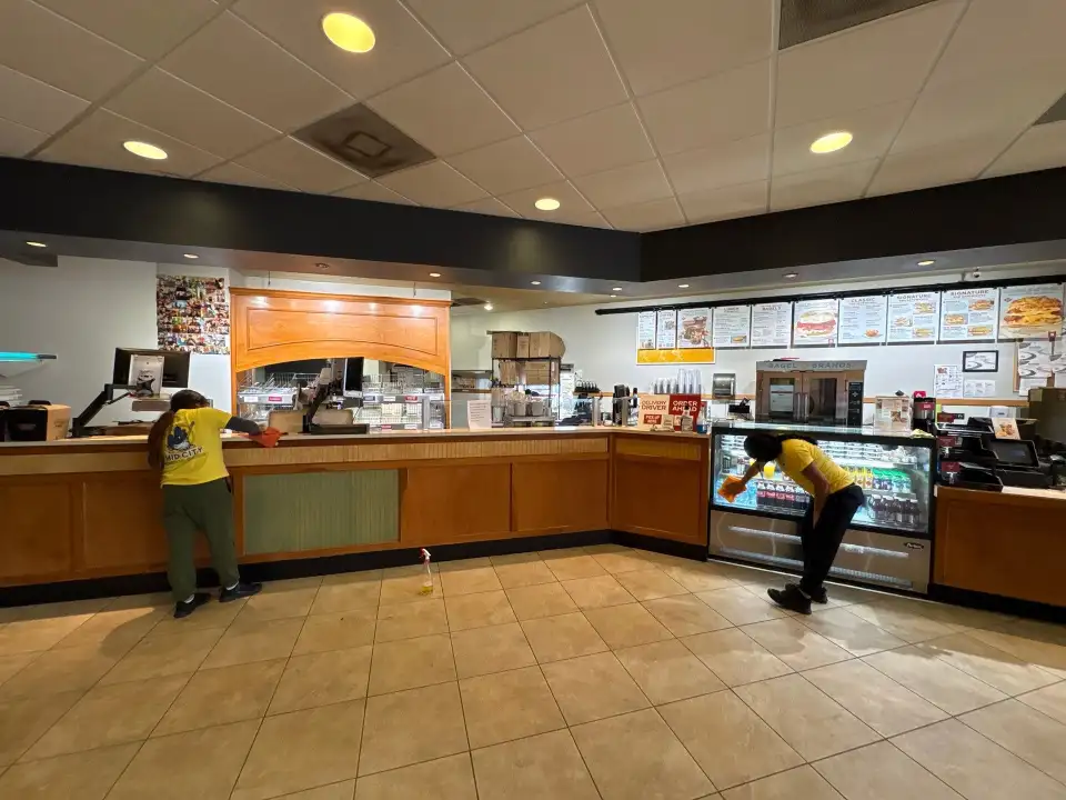 Restaurant counter wiping and sanitation by Mid City Commercial Cleaning in Huntsville, AL
