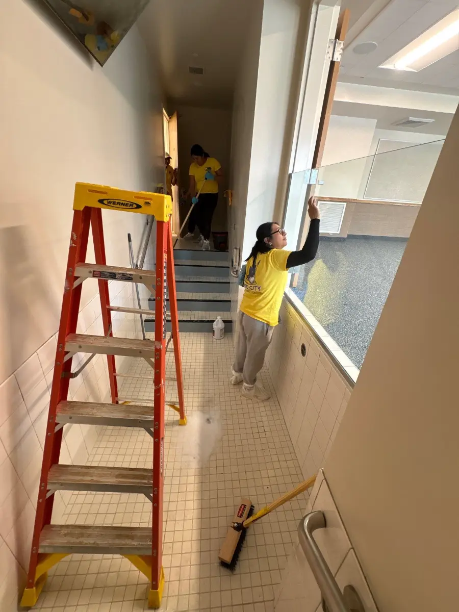 Glass and floor cleaning along a commercial walkway in Huntsville, AL