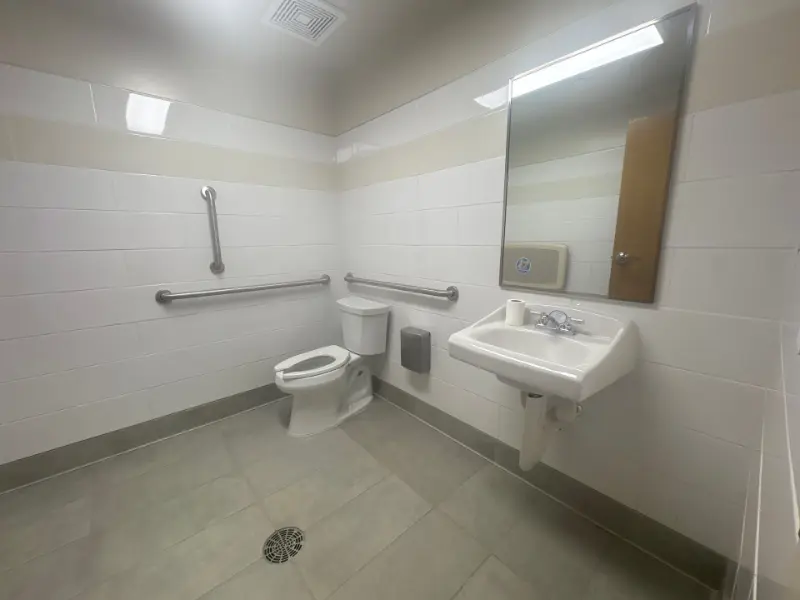 Clean ADA-accessible hospital restroom maintained by Mid City Commercial Cleaning in Huntsville, AL