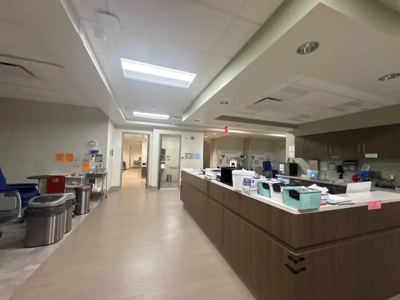 Clean infusion center desk and hallway in a Huntsville, AL healthcare facility