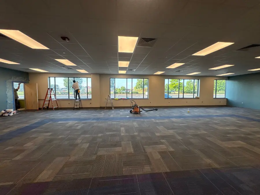 Large carpeted commercial room maintained by Mid City's janitorial and night crew in Huntsville, AL