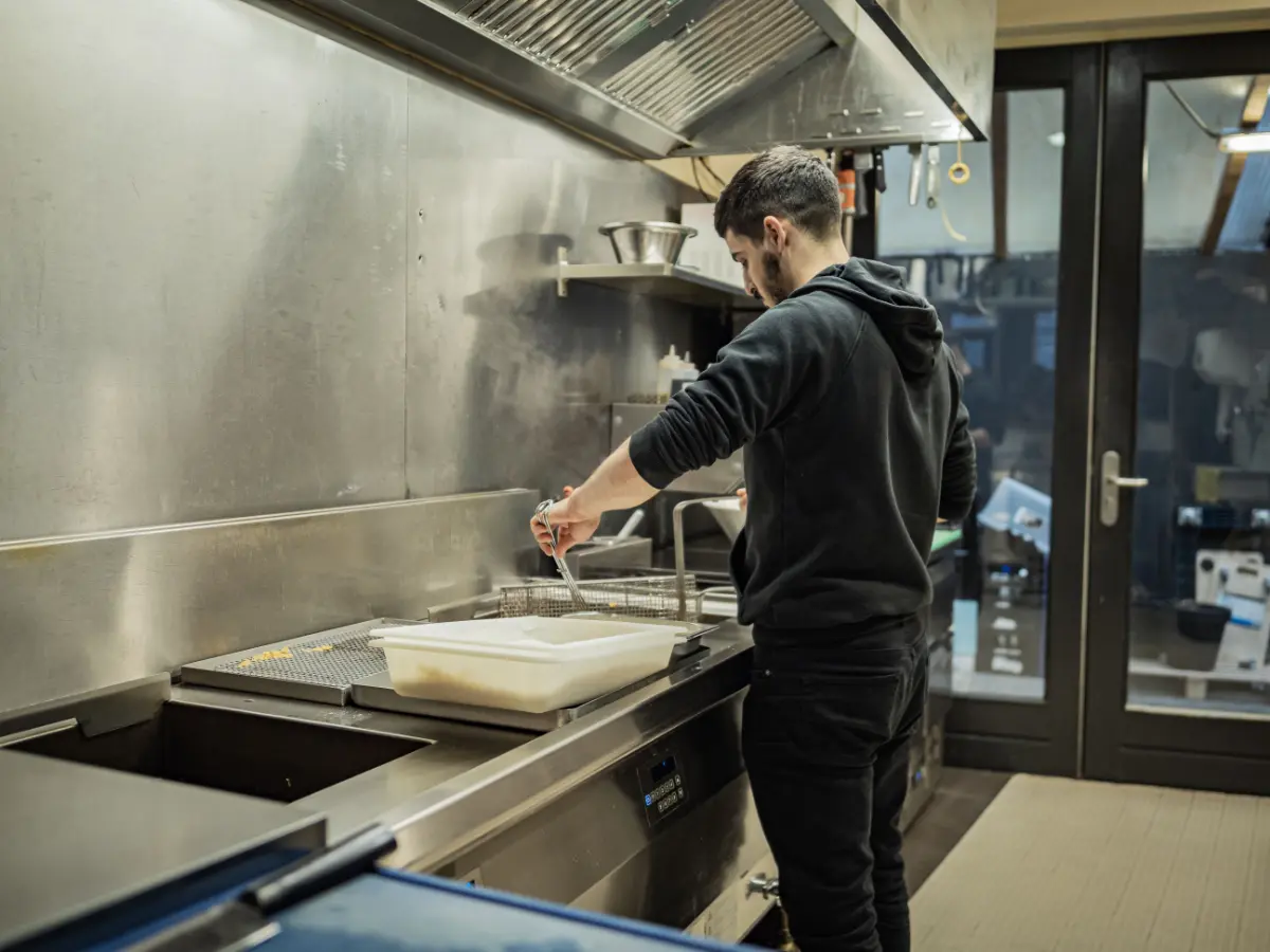 Restaurant kitchen exhaust hood and baffle filters degreased by Mid City Commercial Cleaning in Huntsville, AL
