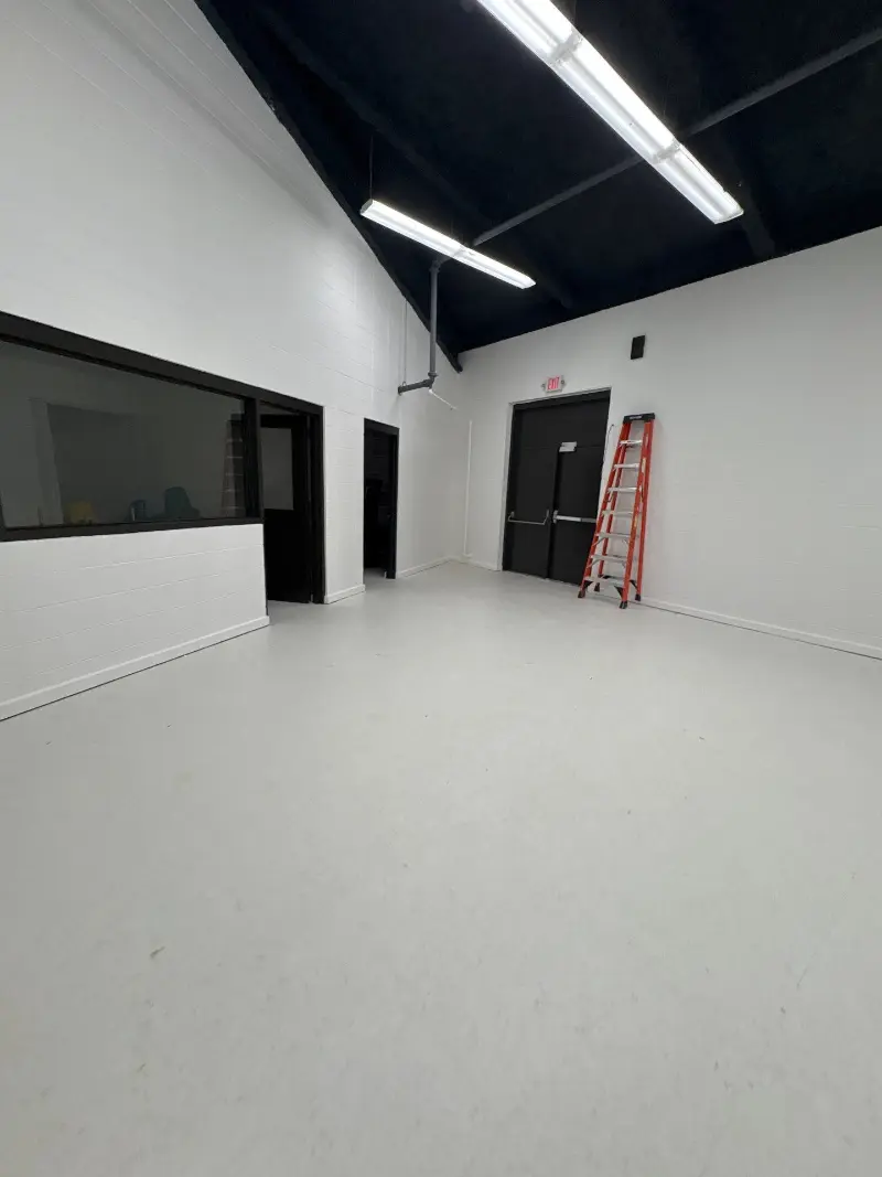 Wide hospital hallway being cleaned by Mid City Commercial Cleaning in Huntsville, AL